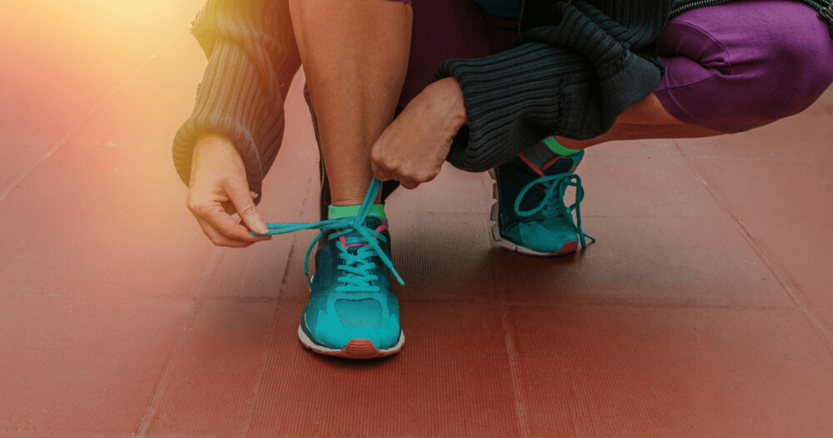 woman paying attention to athletes foot tips by wearing clean shoes that fit